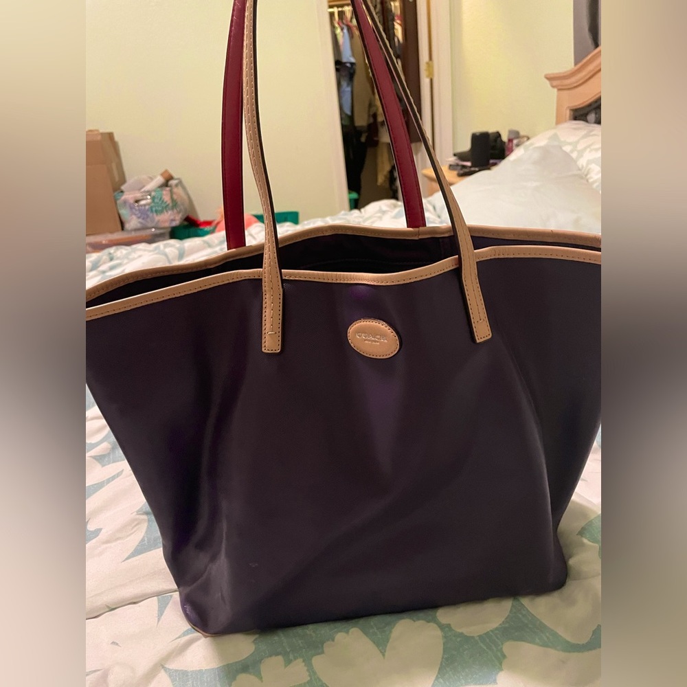 Purple leather tote bag